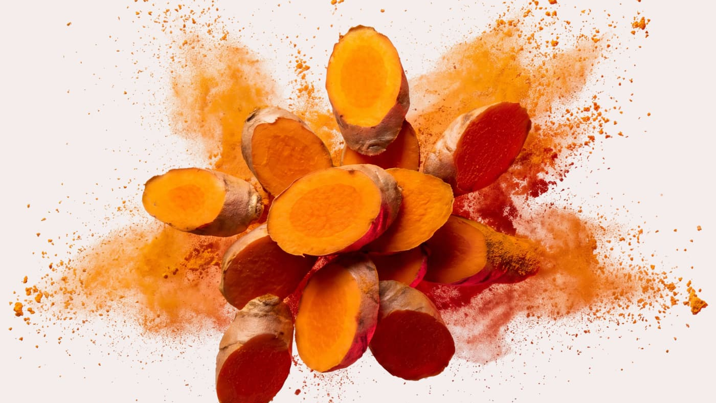 KURK liquid curcumin being dispensed into water